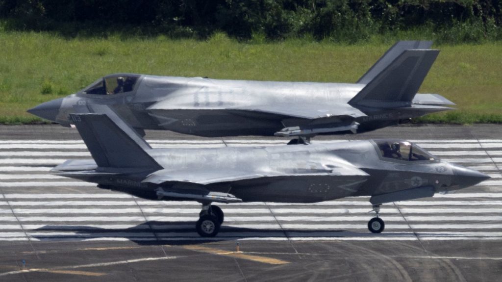 Two U.S. Marine Corps F-35 fighter jets taxi wait on the tarmac at the former Roosevelt Roads military base, Ceiba, Puerto Rico, Sept. 30, 2025.