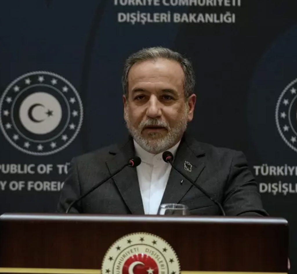 Iranian Foreign Minister Abbas Araghchi speaks to journalists during a joint press conference